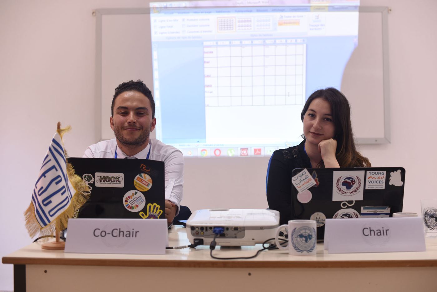 Committee chair and co-chair at their desk