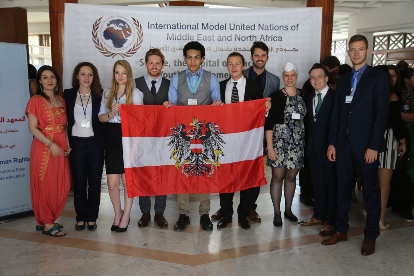 Delegates holding the Austrian flag