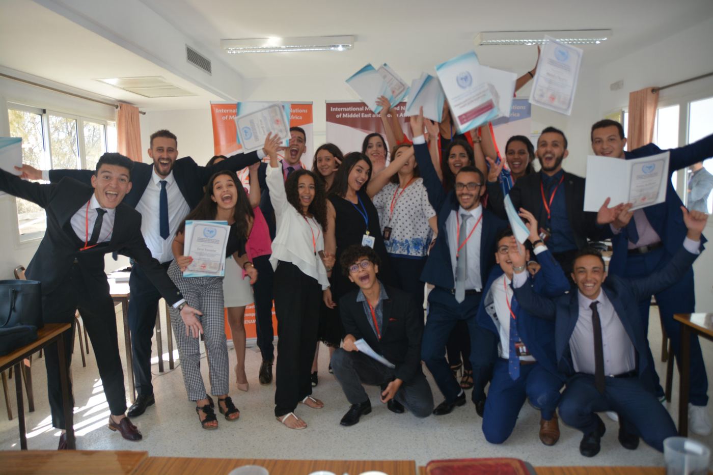 A large group of AOD participants celebrating with their certificates